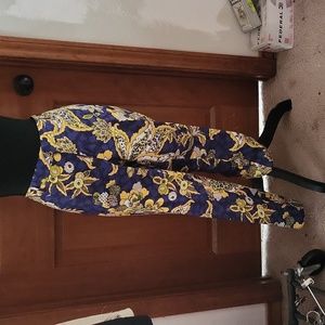 floral dress pants with front and back pockets and front zipper.